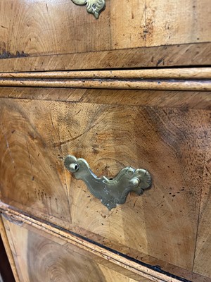 Lot 410 - A George I oyster-veneered walnut chest on stand