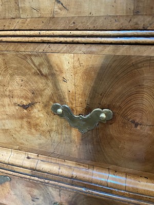 Lot 410 - A George I oyster-veneered walnut chest on stand