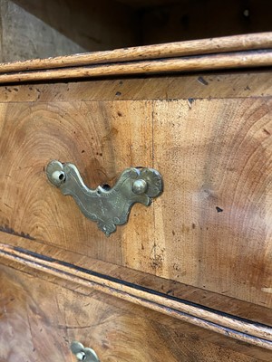 Lot 410 - A George I oyster-veneered walnut chest on stand