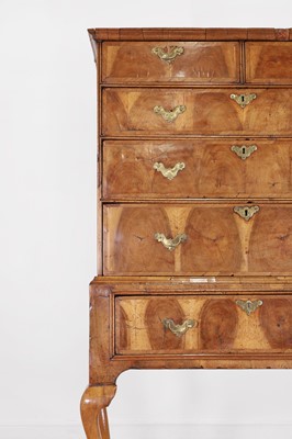 Lot 410 - A George I oyster-veneered walnut chest on stand