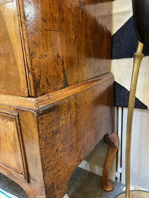 Lot 410 - A George I oyster-veneered walnut chest on stand