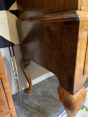 Lot 410 - A George I oyster-veneered walnut chest on stand