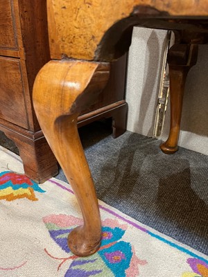 Lot 410 - A George I oyster-veneered walnut chest on stand