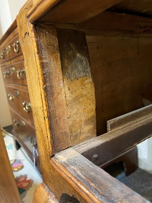 Lot 410 - A George I oyster-veneered walnut chest on stand