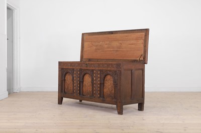 Lot 416 - An inlaid oak chest