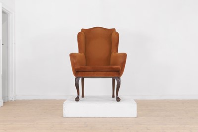 Lot 388 - A George II-style mahogany wing-back armchair