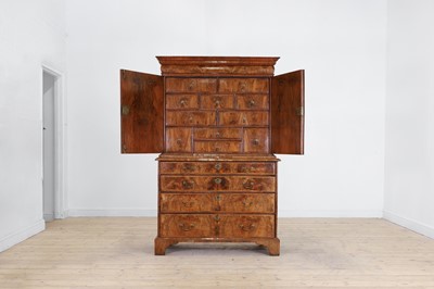 Lot 379 - A George I walnut cabinet on chest