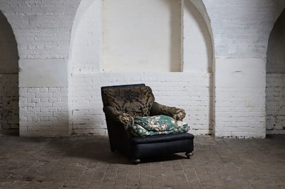 Lot 181 - A deep-seated upholstered armchair