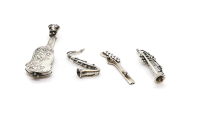 Lot 67 - A group of four silver novelty musical instruments