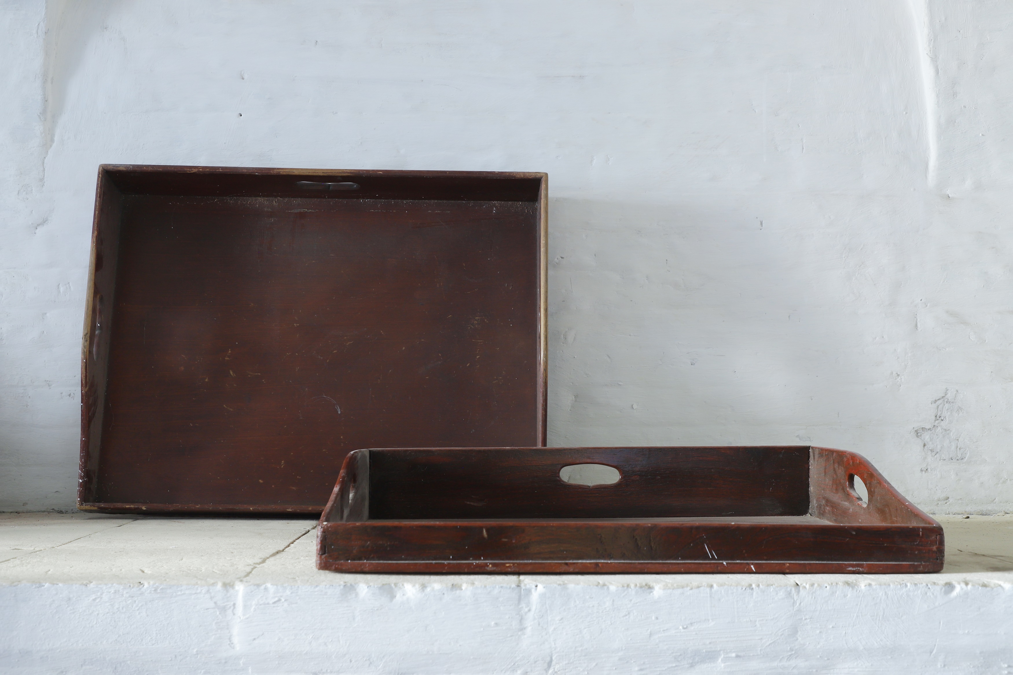 Lot 332 - A near pair of stained pine butler's trays,