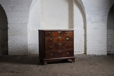 Lot 121 - A George III mahogany and walnut chest of drawers