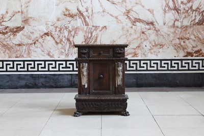 Lot 21 - A carved walnut prie-dieu