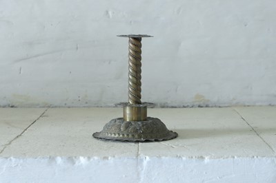 Lot 145 - A 17th-century-style brass candlestick