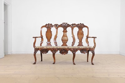 Lot 426 - A George II-style walnut chair-back settee