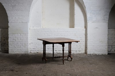 Lot 161 - A walnut Sutherland table