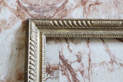 Lot 23 - A large giltwood picture frame