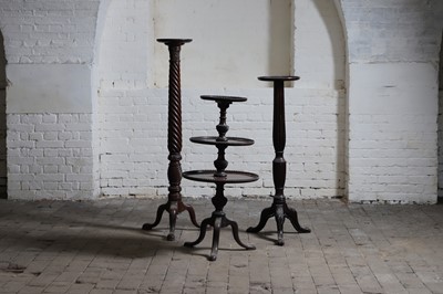 Lot 120 - Two George III-style mahogany torchères