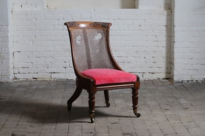 Lot 49 - A Regency rosewood bergère parlour or library chair