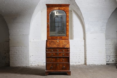 Lot 177 - A narrow walnut bureau bookcase