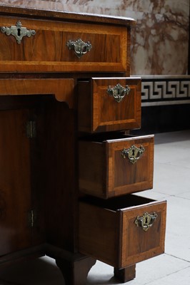 Lot 74 - A George I walnut kneehole desk or dressing table