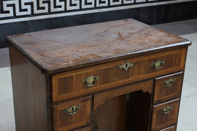 Lot 74 - A George I walnut kneehole desk or dressing table