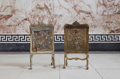 Lot 216 - A pair of carved and giltwood fire screens