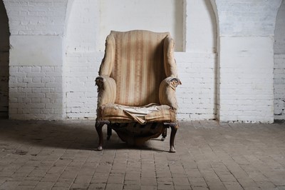 Lot 66 - A George III wingback chair