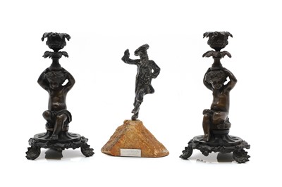 Lot 368 - A pair of bronze candlesticks