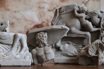 Lot A group of Roman carved marble fragments