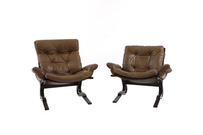 Lot 484 - A near pair of Norwegian 'Skyline' beech bentwood lounge chairs