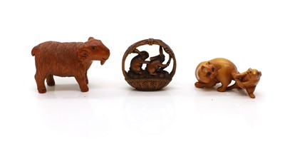 Lot 195 - A group of three Japanese boxwood netsuke