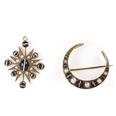 Lot 15 - A Victorian crescent moon brooch and matching starburst pendant