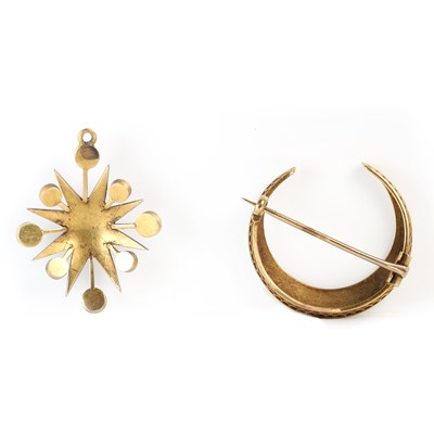 Lot 15 - A Victorian crescent moon brooch and matching starburst pendant