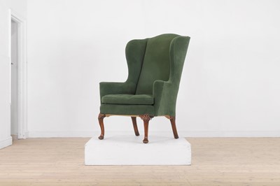 Lot 427 - A George II-style walnut wing-back armchair