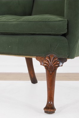 Lot 427 - A George II-style walnut wing-back armchair