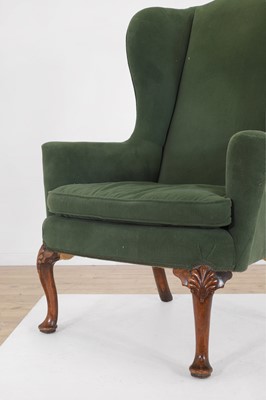 Lot 427 - A George II-style walnut wing-back armchair