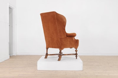 Lot 428 - A William and Mary-style walnut wing-back armchair