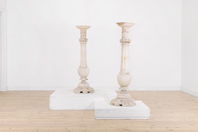 Lot 446 - A pair of weathered alabaster pedestals