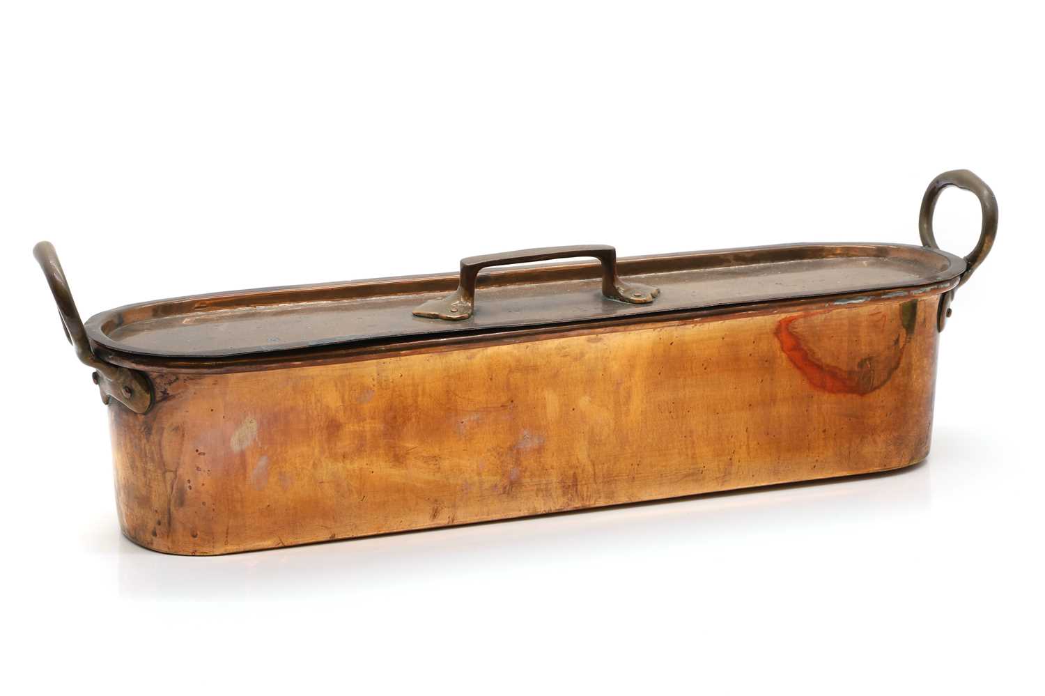 Lot 323 - A copper fish kettle,