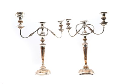 Lot 38 - A pair of Victorian silver-plated candelabras
