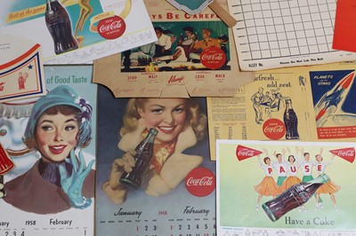 Lot 184 - A group of Coca-Cola advertising calendars and ephemera