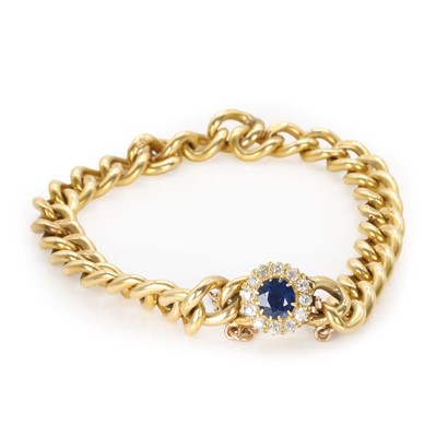 Lot 45 - An 18ct gold solid curb link bracelet with a sapphire and diamond clasp