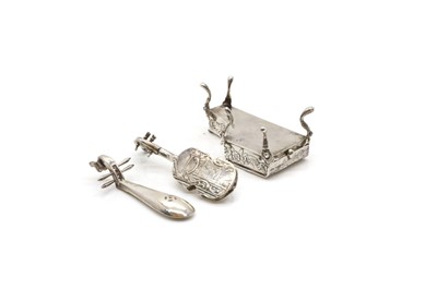 Lot 28 - A group of silver novelty musical instruments