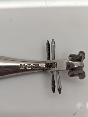 Lot 28 - A group of silver novelty musical instruments