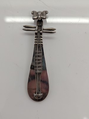 Lot 28 - A group of silver novelty musical instruments