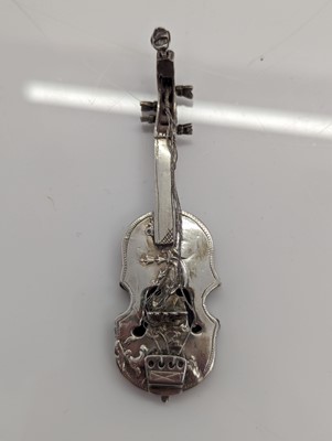Lot 28 - A group of silver novelty musical instruments