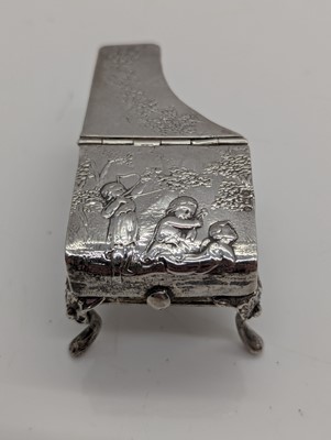 Lot 28 - A group of silver novelty musical instruments