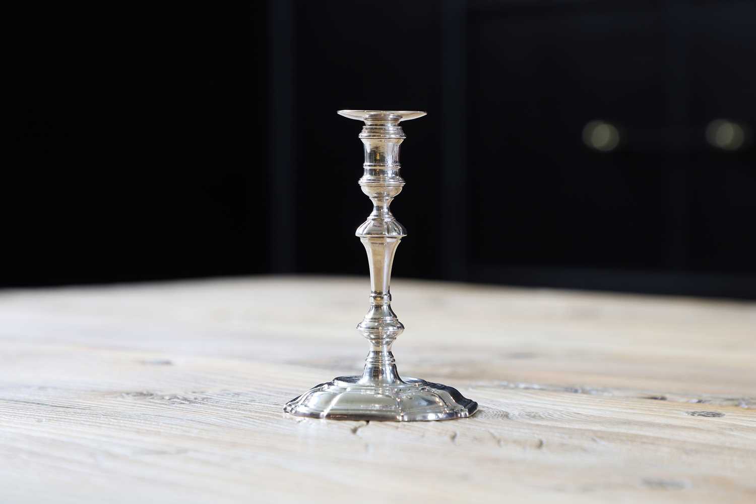 Lot 235 - A George II silver taperstick