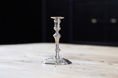 Lot 235 - A George II silver taperstick