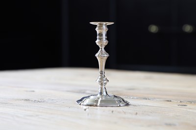 Lot 235 - A George II silver taperstick